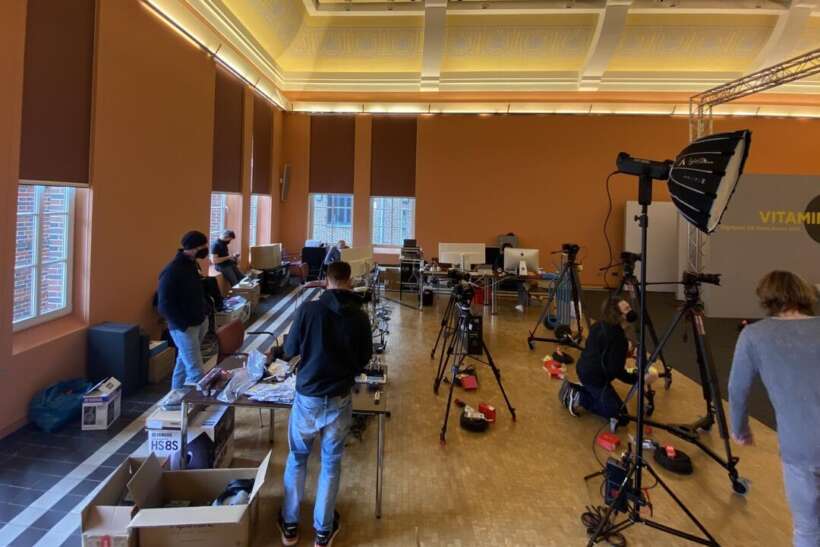 technicians build up cameras lighting