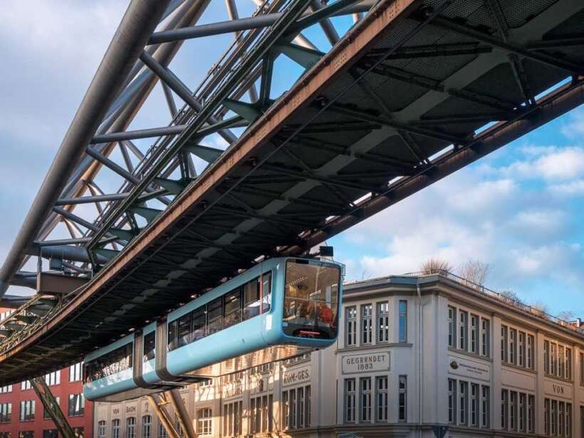 Famous Wuppertal Schwebebahn passes office building